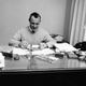IKEA founder Ingvar Kamprad perusing the catalogue in 1964.